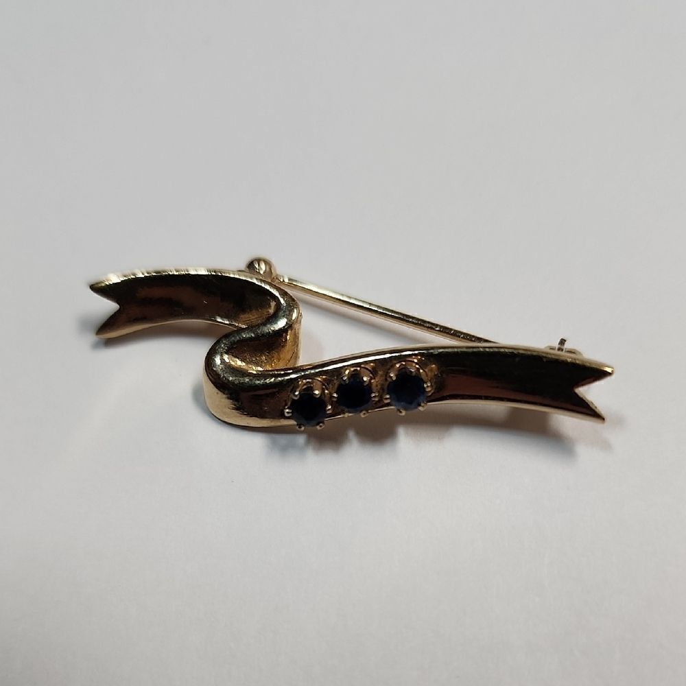 Avon Gold Tone Blue Sapphire Ribbon Pin, Signed